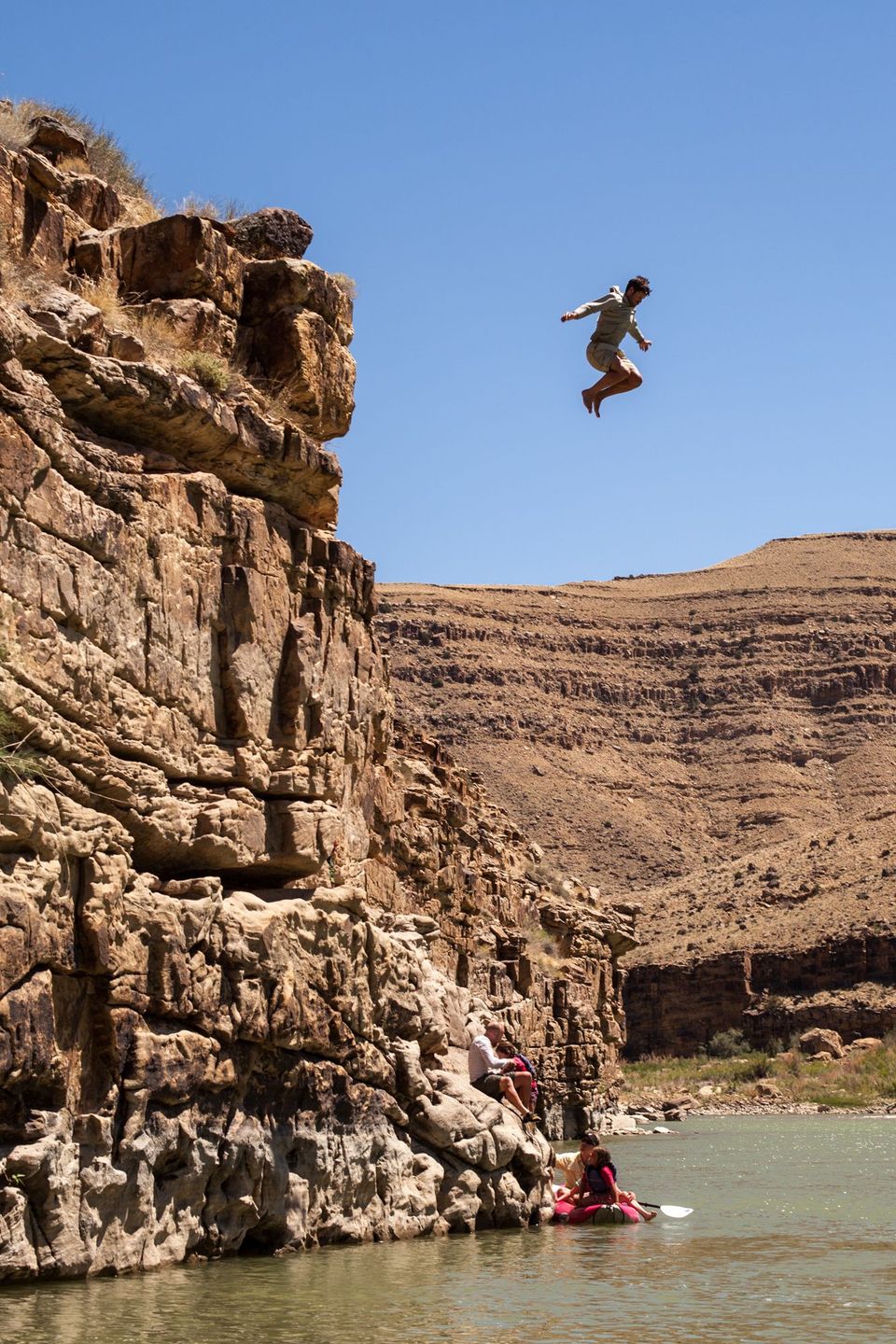 1, 2, 3... Dropping!. What's a river trip without a cliff jump? Albert goes off the top on the Green through Desolation and Gray Canyons.