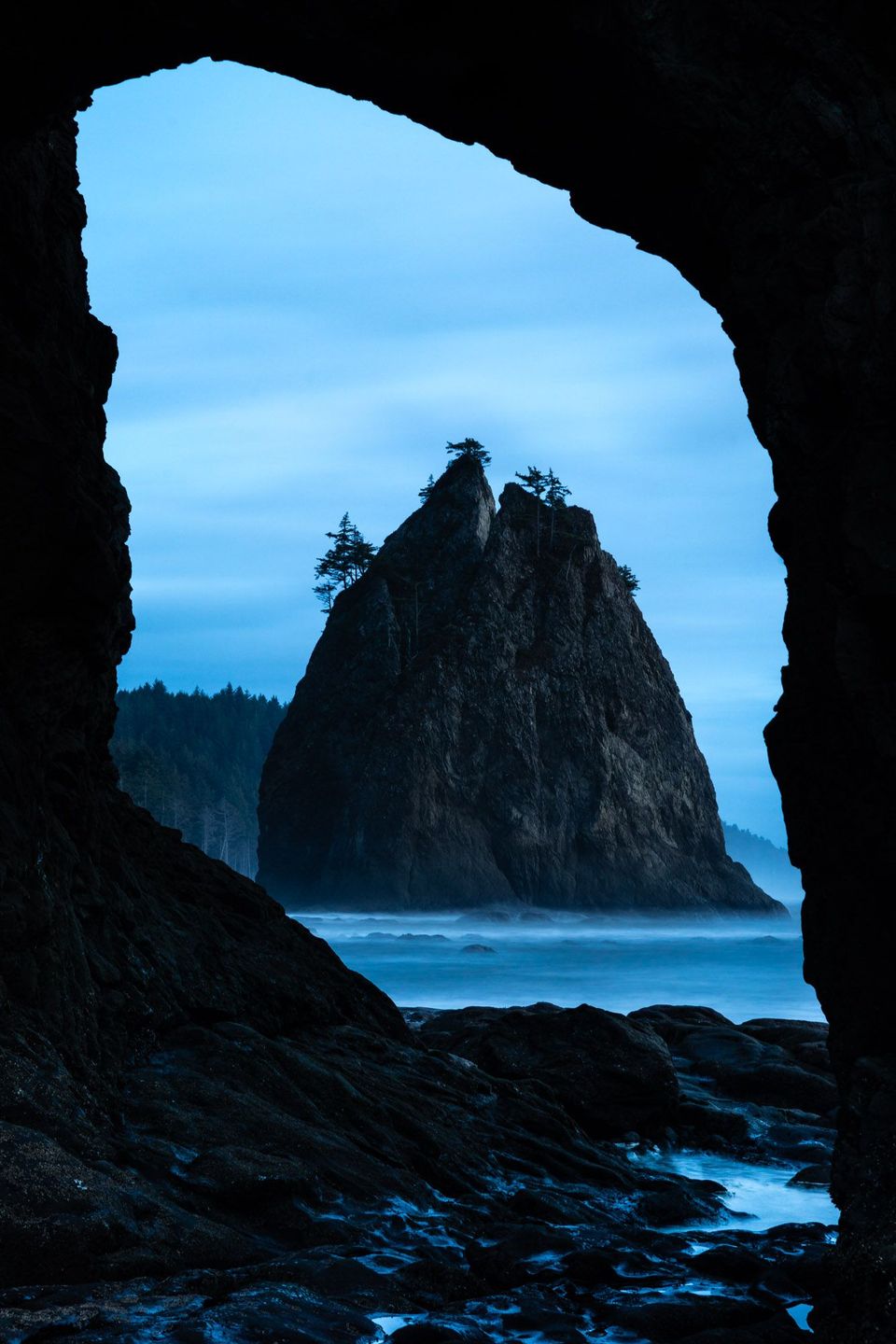 Hole in the Wall. Looking south onto Rialto Beach through Hole in the Wall, the remains of an ancient headland. Olympic National Park, Washington.