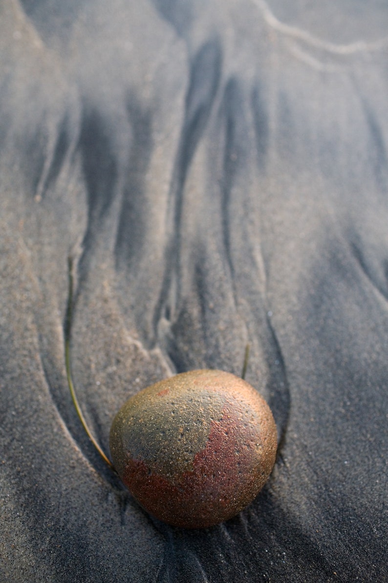 Lone Stone, Cardiff, California. A lone rock makes its mark in the sand.