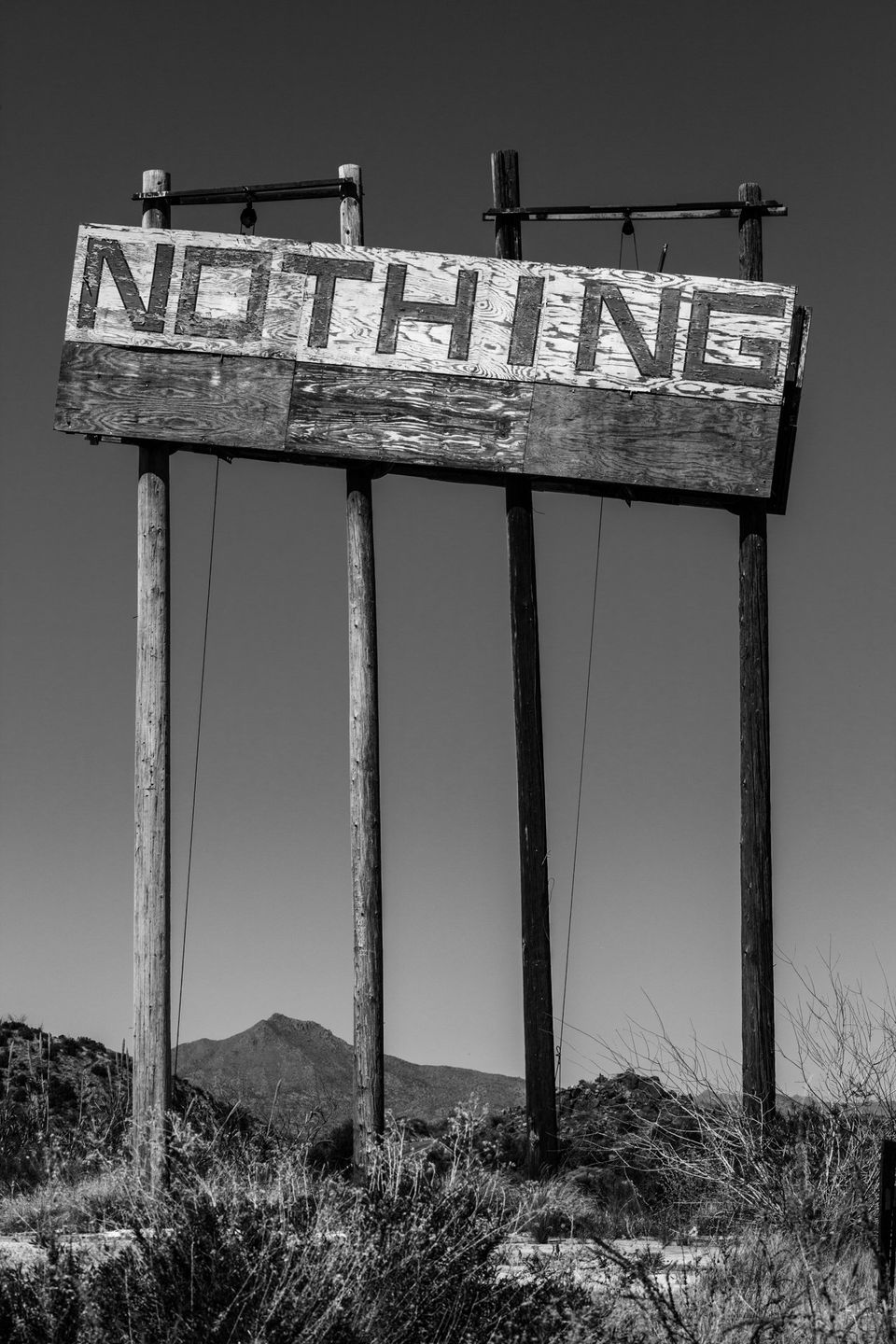 Nothing, Arizona. All or nothing. Human structures left to the elements without upkeep wither and are reclaimed as soon as they are neglected.