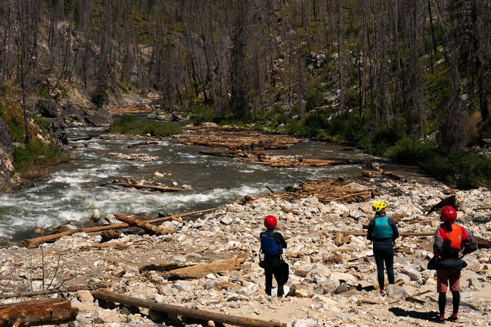 Scouting Five Mile Rapid. After the 2023 blowouts changed everything, even veterans scouted nearly every rapid on the Middle Fork.