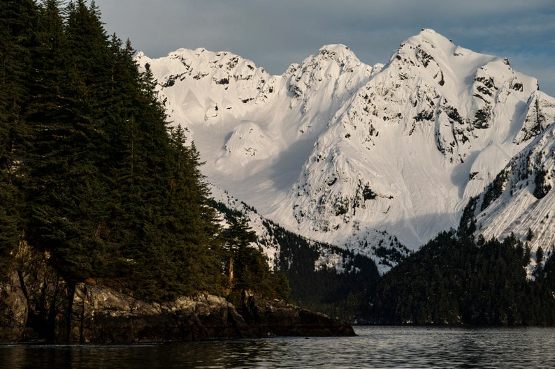 Thumb Cove, Resurrection Bay, Alaska. Snowy mountains at the entrance to Thumb Cove in Resurrection Bay near Seward.