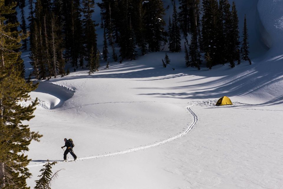 Winter Camping. Less is more. Baldwin Goodell skins away from the tent for a day in the wilderness.